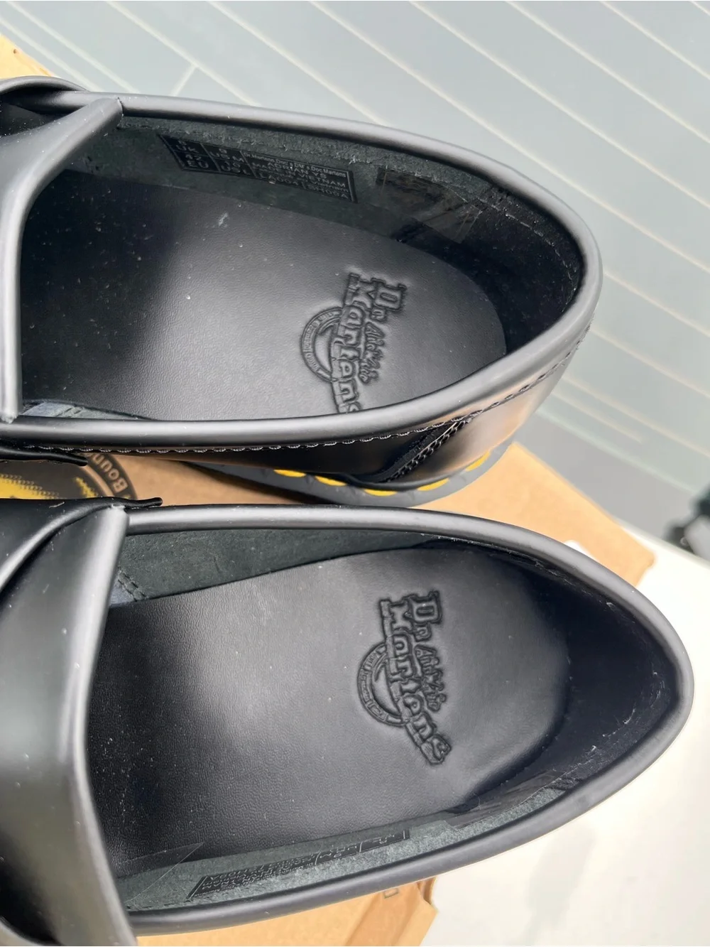 Dr. Martens Black Tassel Kiltie Loafers with Yellow Stitching